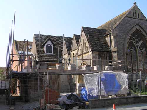 Scaffolding is now in place and the walls continue to grow in height.