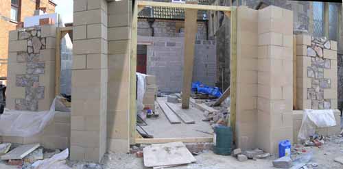 8/5/08 The doorway and windows start to take shape.